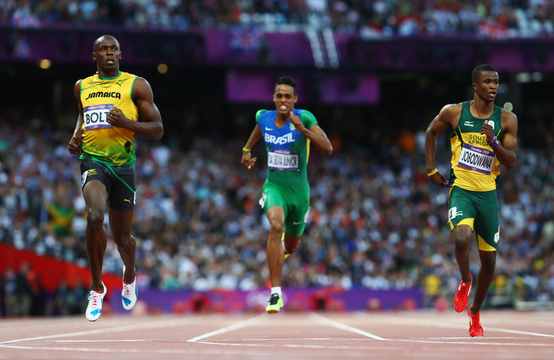 Illustration for article titled Photos Of Usain Bolt Looking Bored As He Blows Past The Best Runners In The World